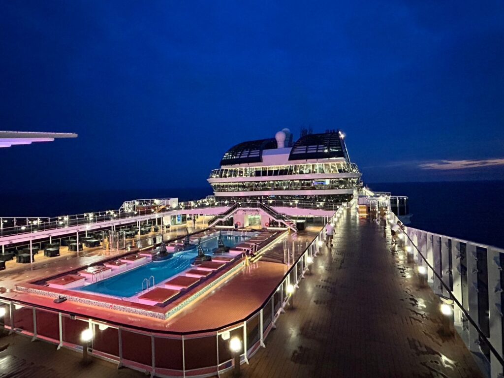 The outdoor swimming pool on the top deck of the MSC