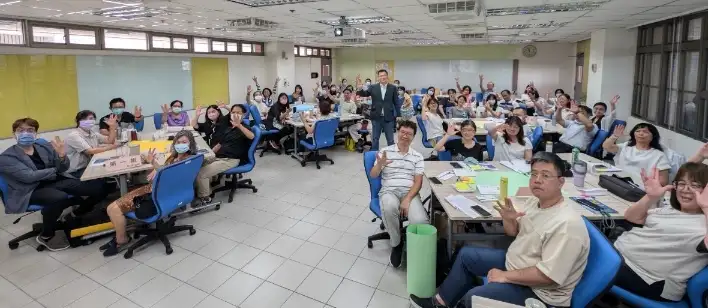 I took a group photo with the officials from the Civil Service Human Resource Development Center, where we posed with the Scrum 33355 hand gesture.