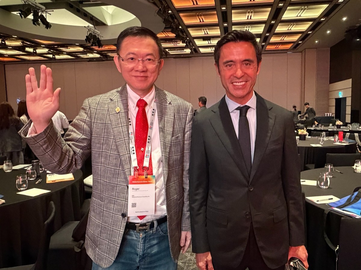 Roger Chou with PMI Global President Pierre Le Manh
