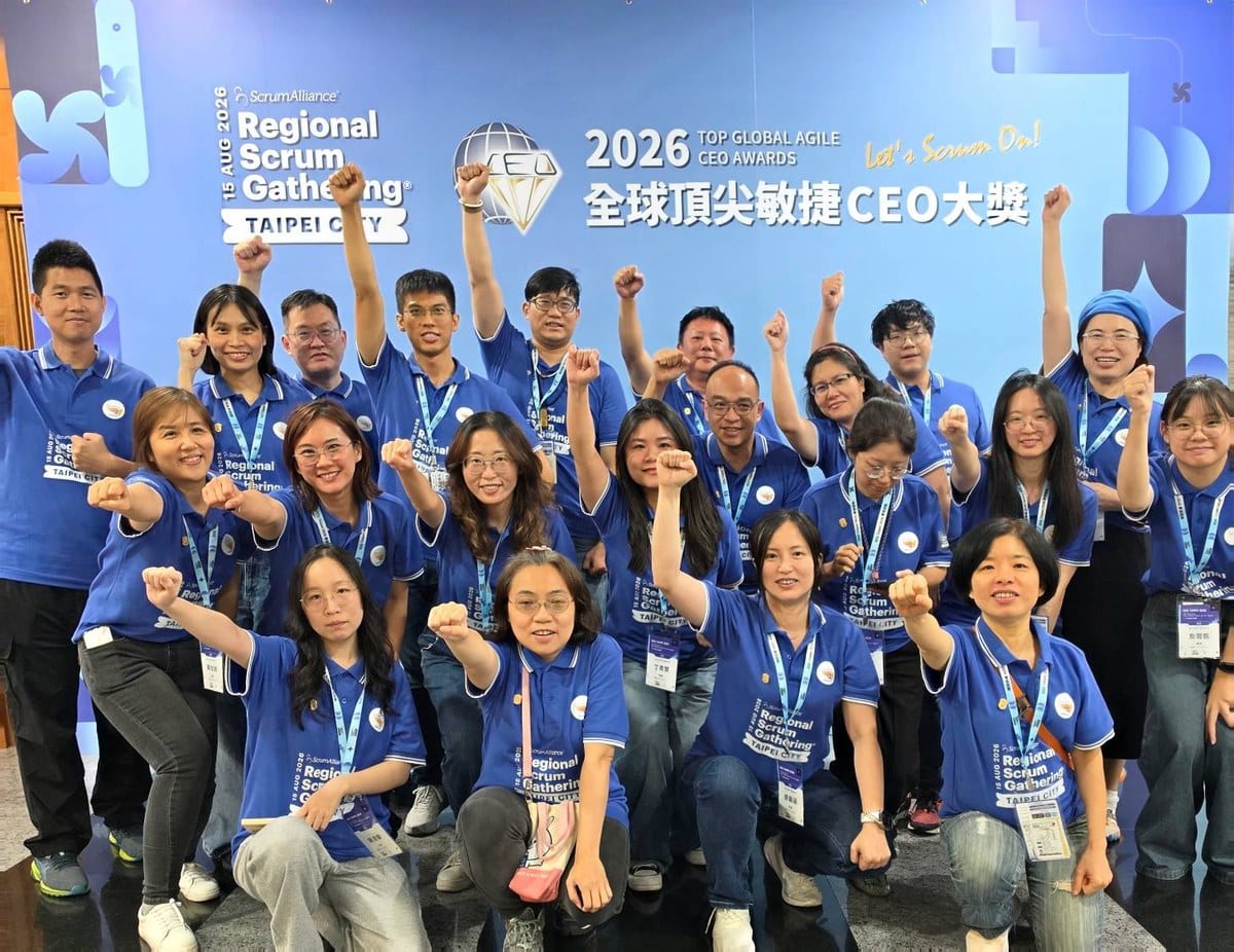 This Isn't Just Another Regional Scrum Gathering: When Scrum Walks Into the CEO's Decision Room 13 Group photo, the volunteer team
